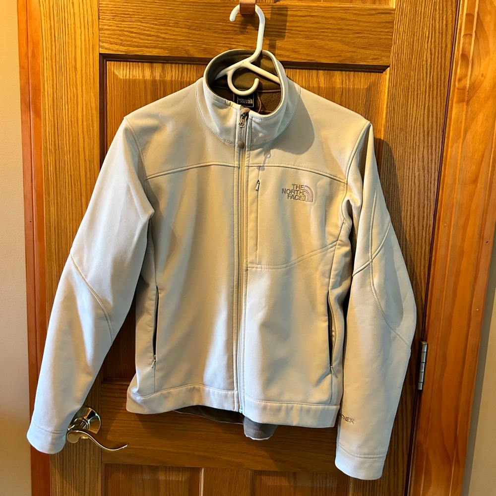 The North Face white jacket, no pulling, minor flaw (see pic)